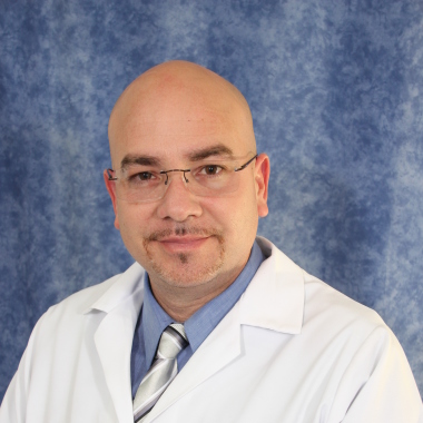 Dr. Adrian Salvent